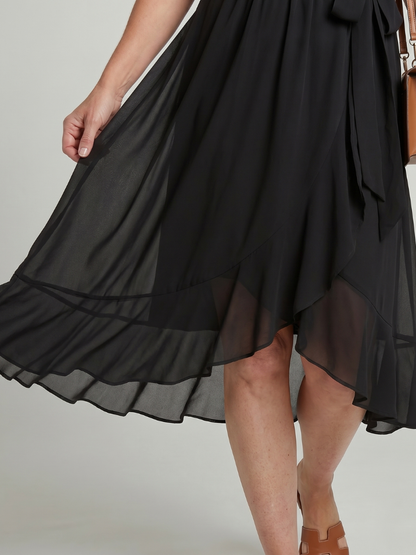 Keziah | Vestido Midi Cruzado con Bajo Fluido
