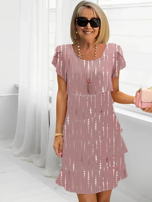 Isabelle – Vestido elegante fluido con volantes
